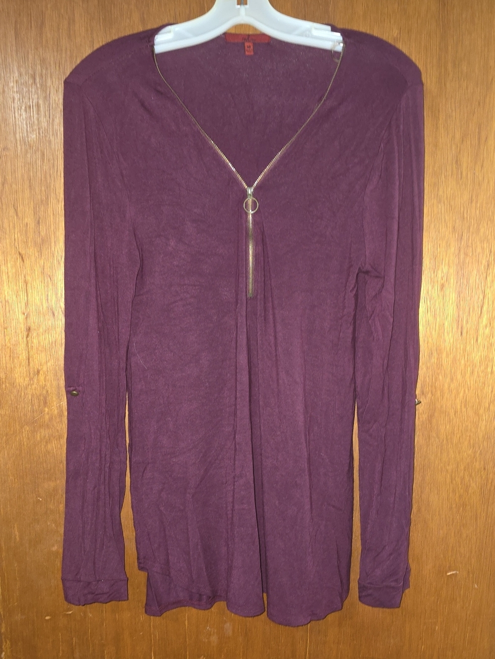 Women's Long Sleeve V-Neck Tunic Top in Plum with Pendant Detail